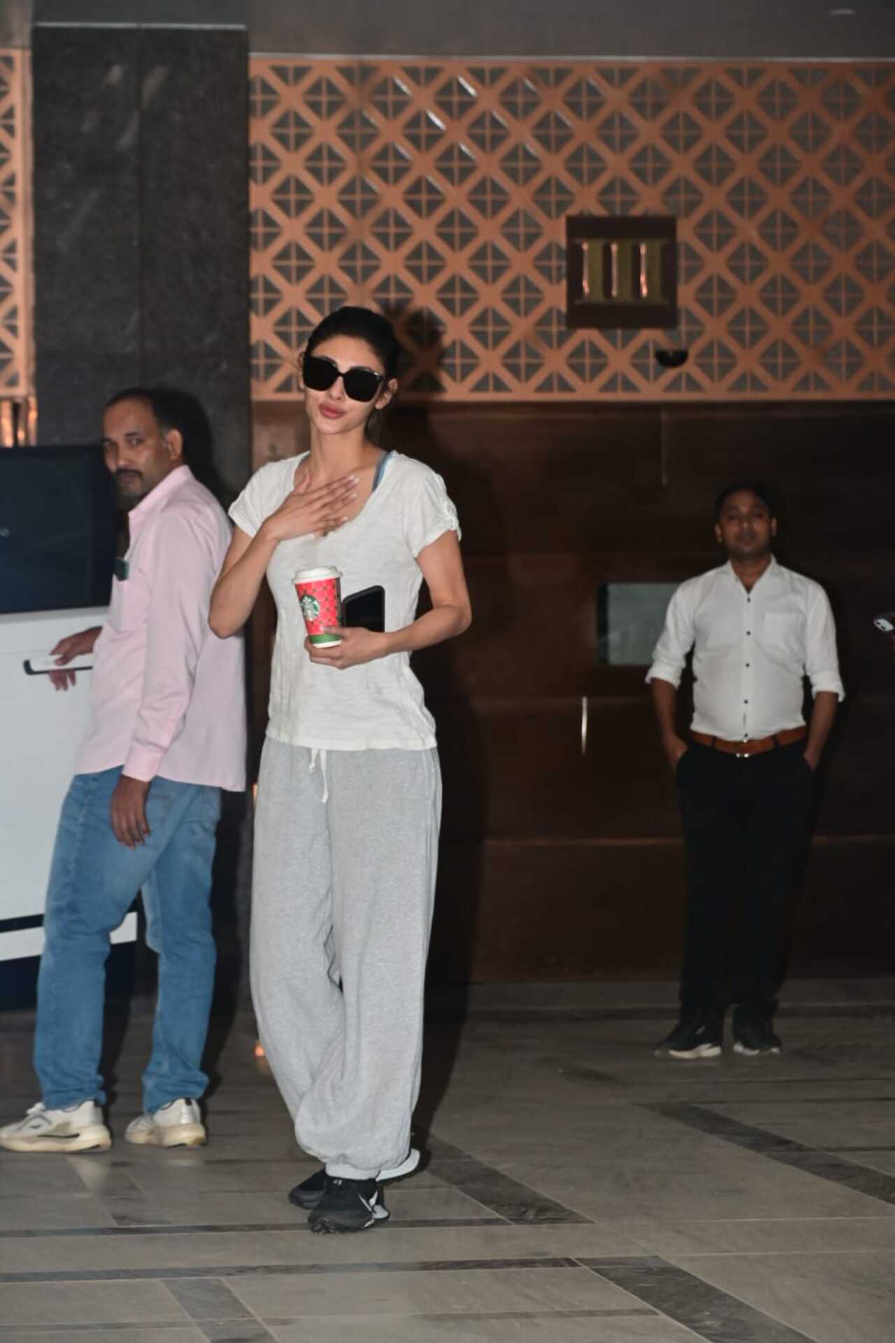 Mouni Roy was also spotted stepping out in a white t-shirt, grey track pants and large sunglasses.